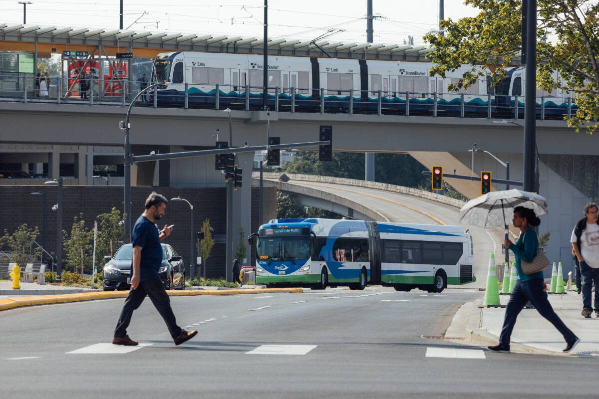 Pedestrians crossing the street at the new Lynnwood City Center Station. Photo courtesy of Community Transit.